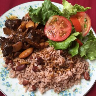 Rice,peas, plantain and oxtails